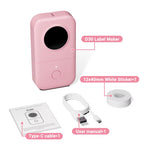 Roze Phomemo D30 met kabel, handleiding en labelrol